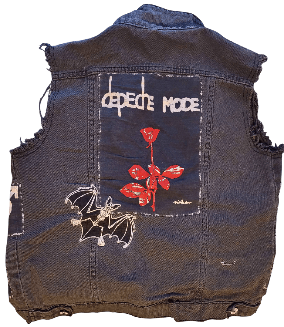 A photo of the back of the vest, with a large Depeche Mode back patch.